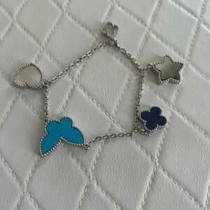 Silver Charm Bracelet with Blue and White Accents
